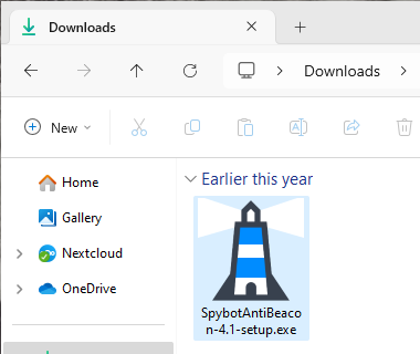 The installation file is saved in your Downloads folder. Double click to open it.